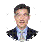 A person in a suit and tieDescription automatically generated